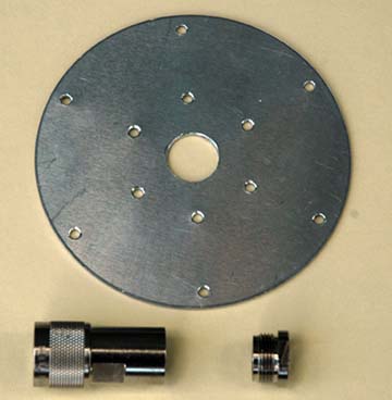 Photo 1 Ground plane radial element mounting plate with related components.