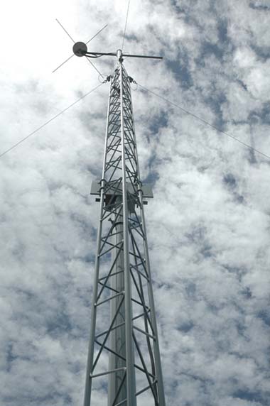 Completed tower assembly in the guyed upright position.
